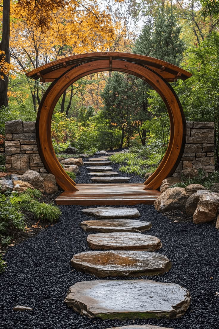 A wooden moon-gate arch opening onto a garden path of stepping stones